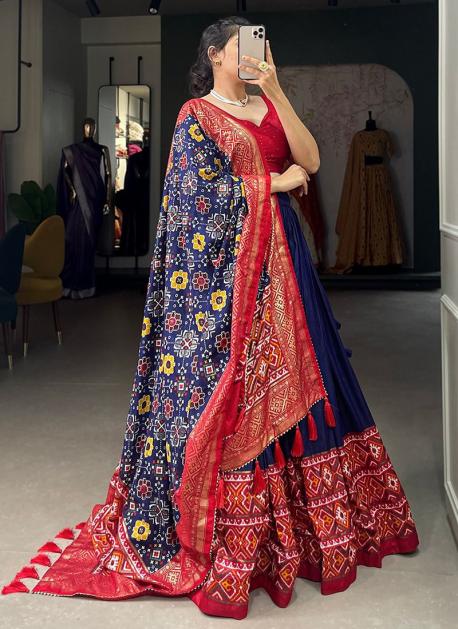 Photo of Red bridal lehenga with blue necklace