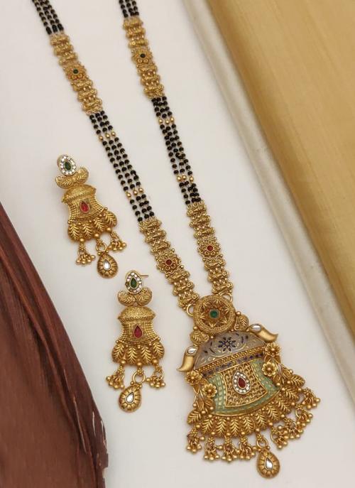 Buy OOMPH Gold Tone American Diamond Floral Mangalsutra Set with Matching  Earrings Online